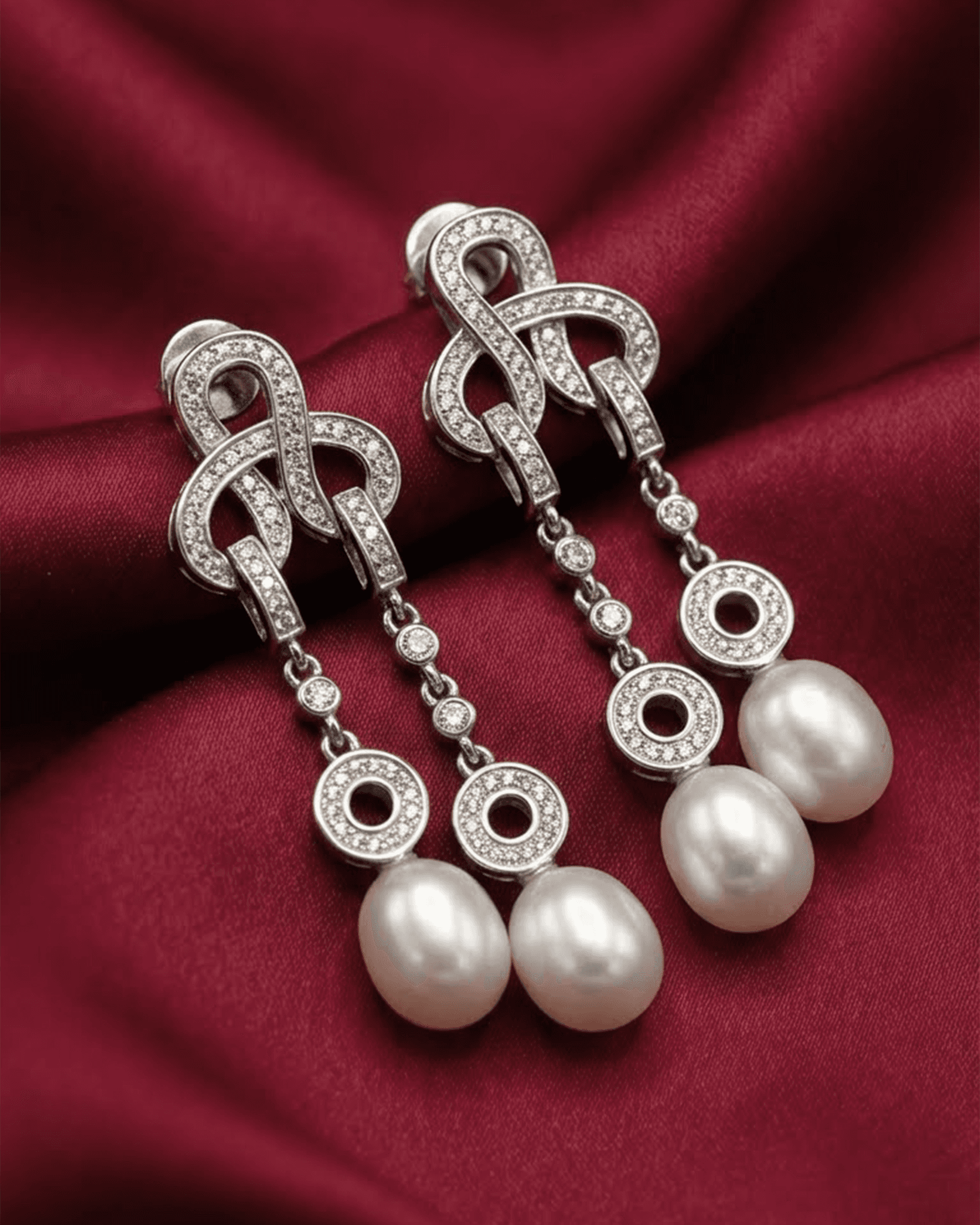 92.5 sterling silver pearl stud earrings featuring a cz diamond halo and screw back closure.