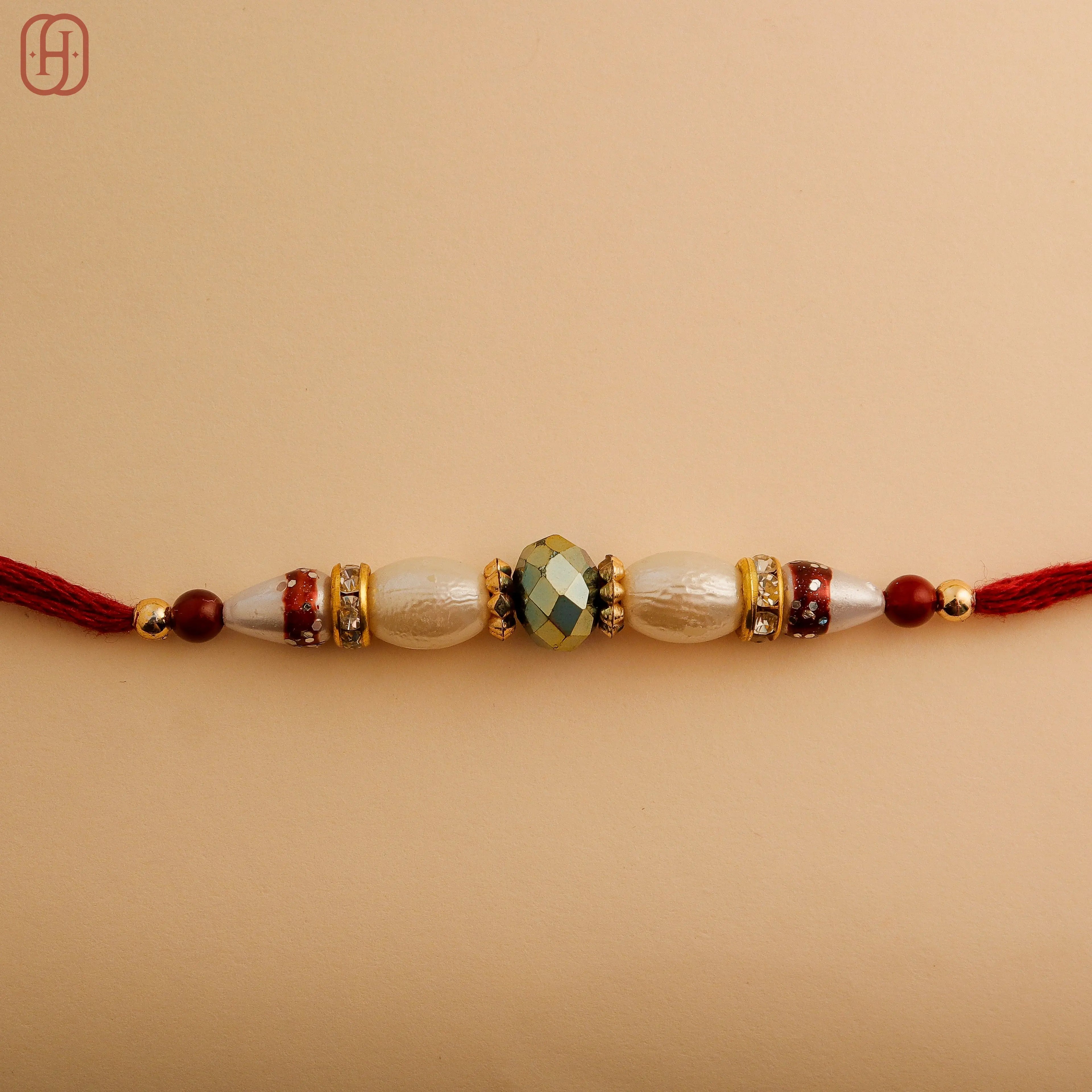 Designer Rakhi Bracelet for Brothers by Hardik Jewels.