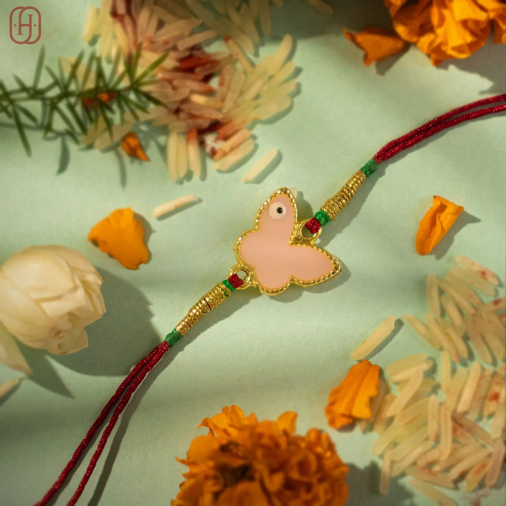 Hardik Jewels Elegant Silver Charm Rakhi for Brotherhood.