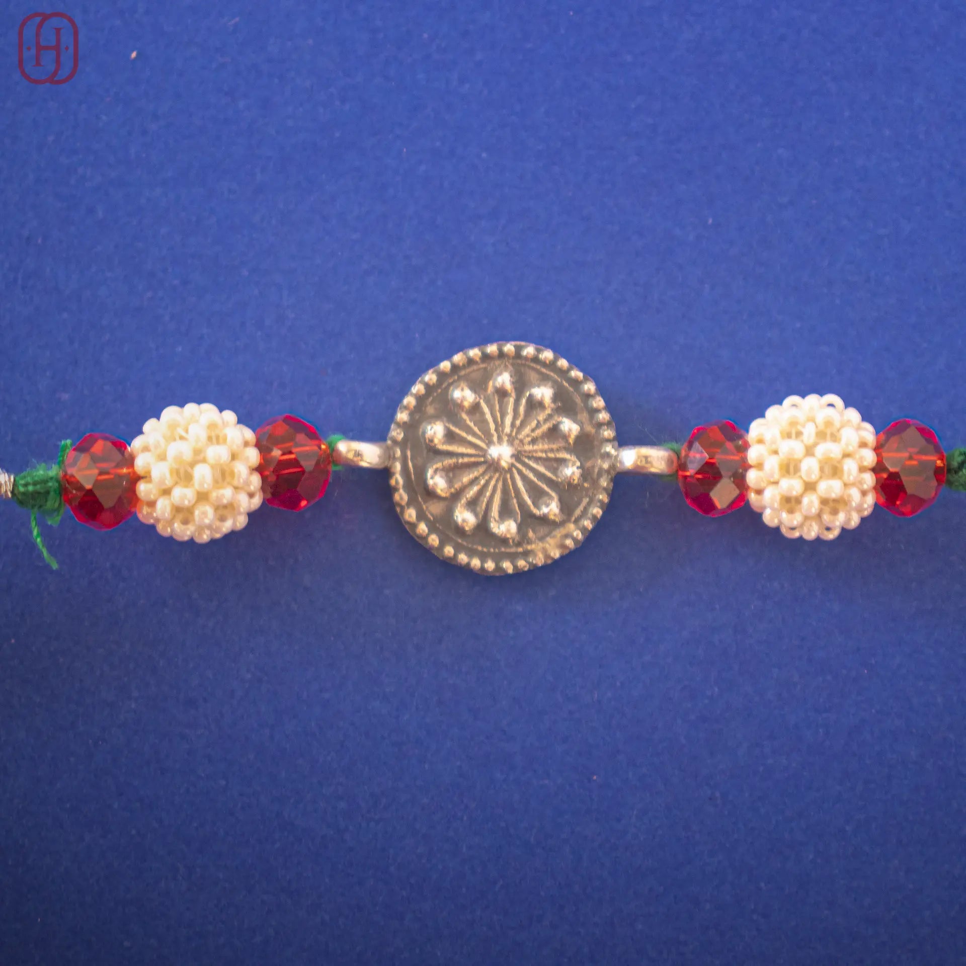 Hardik Jewels Pearl Bead Rakhi Silver - Handcrafted Elegance.