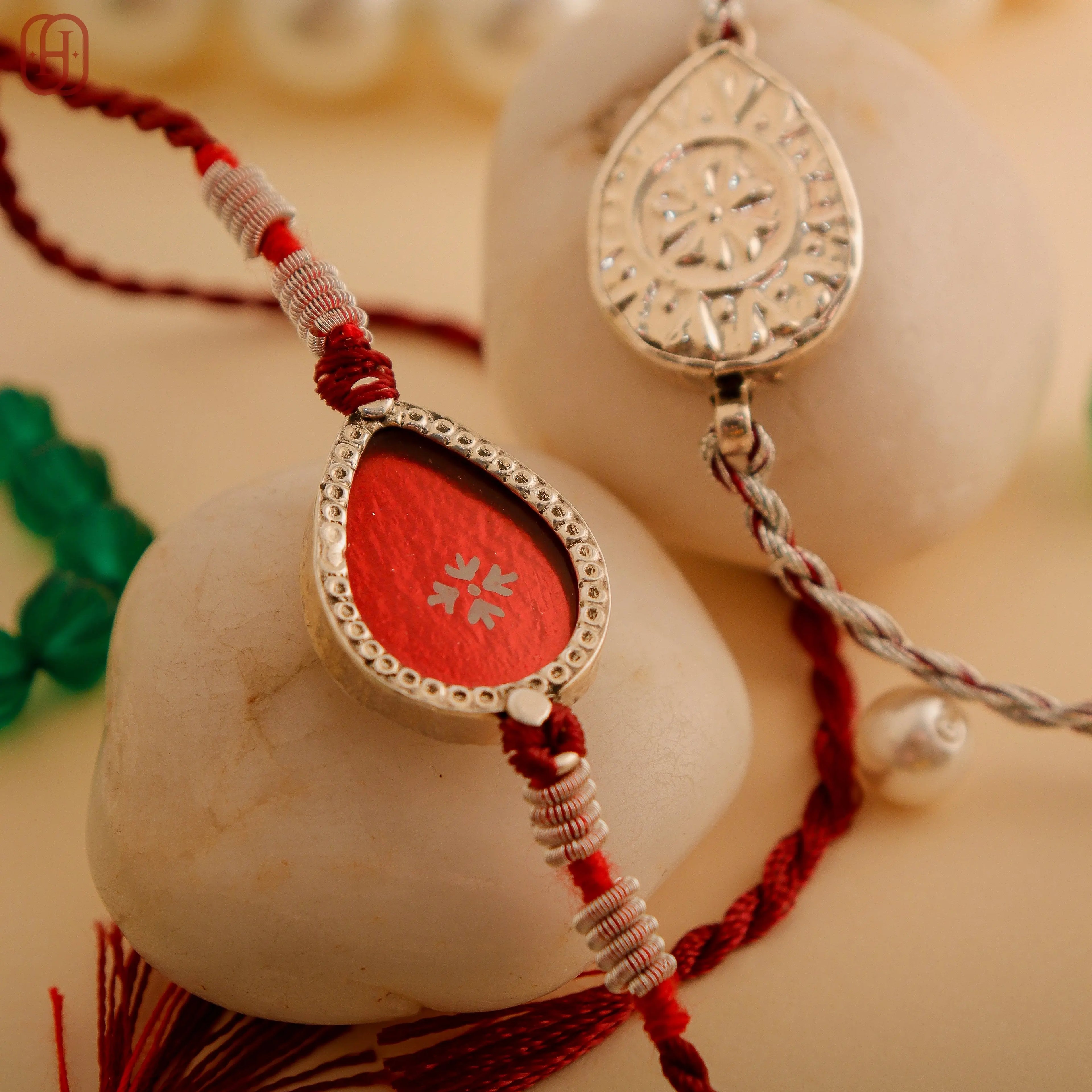 Hardik Jewels Red Enamel Teardrop Rakhi - Handcrafted Elegance.