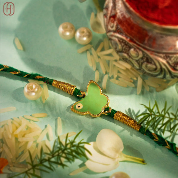 Hardik Jewels Silver Enamel Rakhi Online - Elegant Butterfly Design