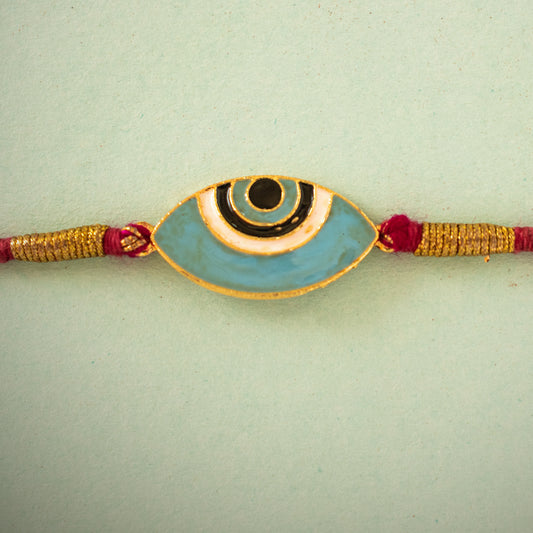 Hardik Jewels Evil Eye Silver Rakhi with Handcrafted Design.