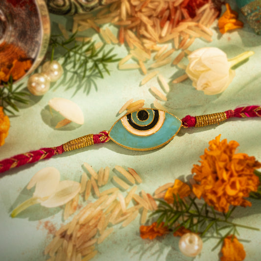 Hardik Jewels Evil Eye Silver Rakhi with Handcrafted Design.