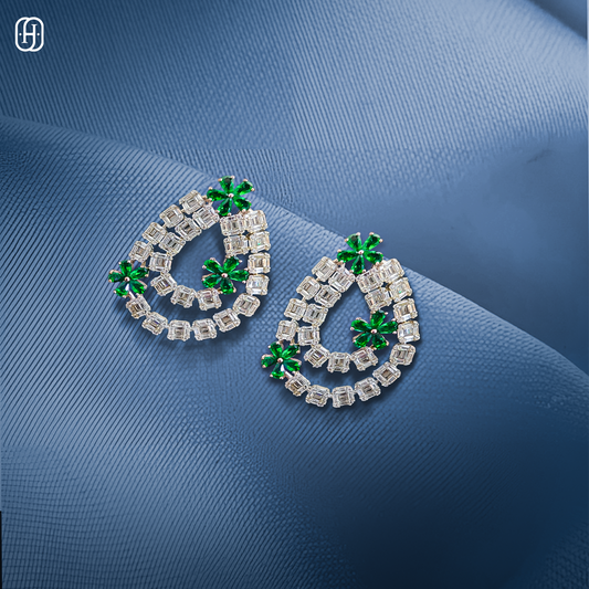 Elegant emerald diamond earrings online featuring green emerald accents and sparkling diamonds