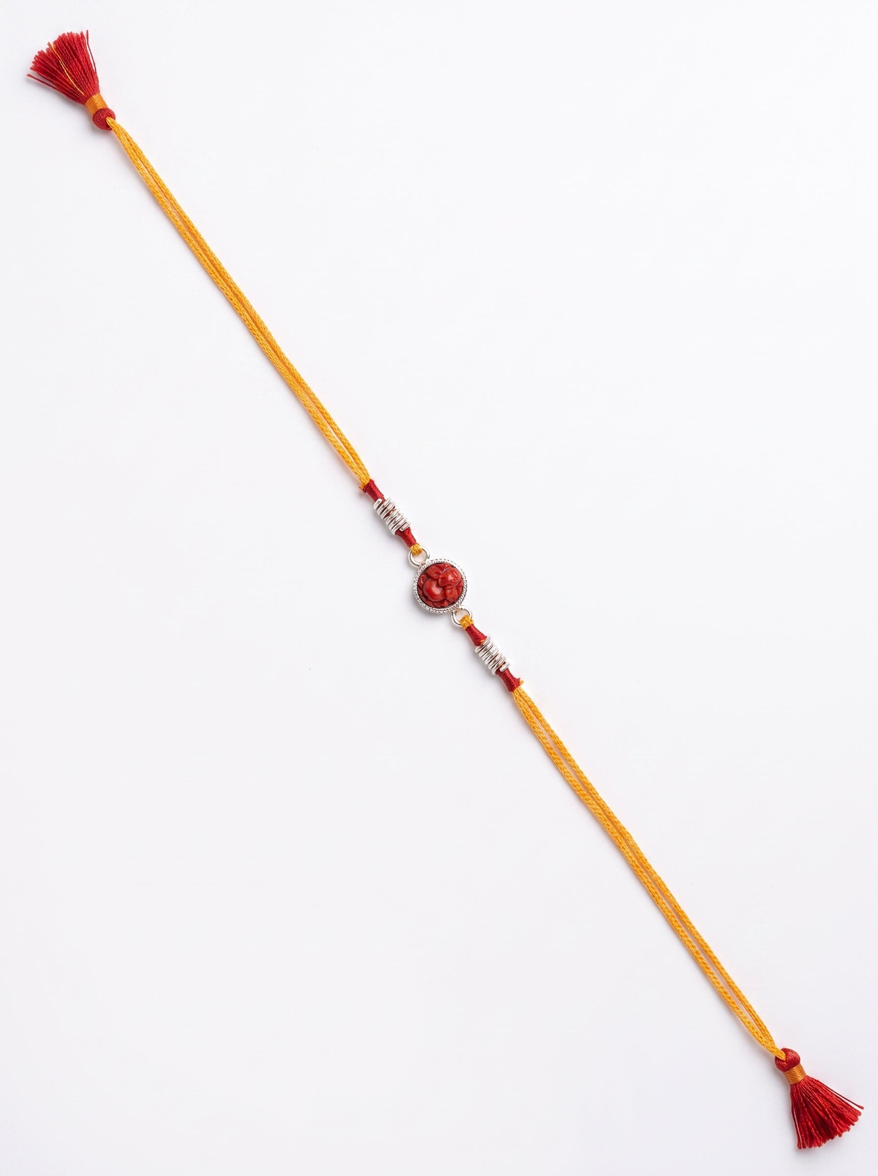Red Coral Ganesh Ji Silver Rakhi - Yellow