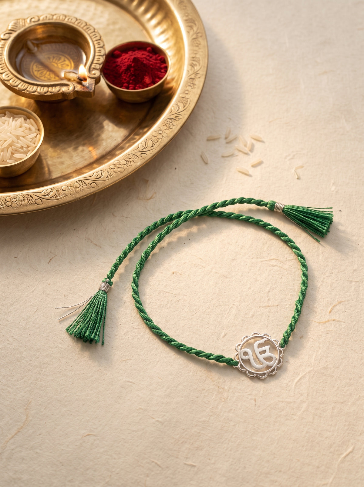 Ik Onkar Silver Rakhi - Green Thread
