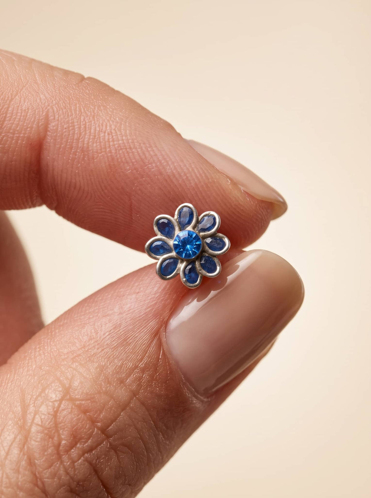 Blue Enamel Flower Silver Stud Earrings - close-up detail view - Hardik Jewels