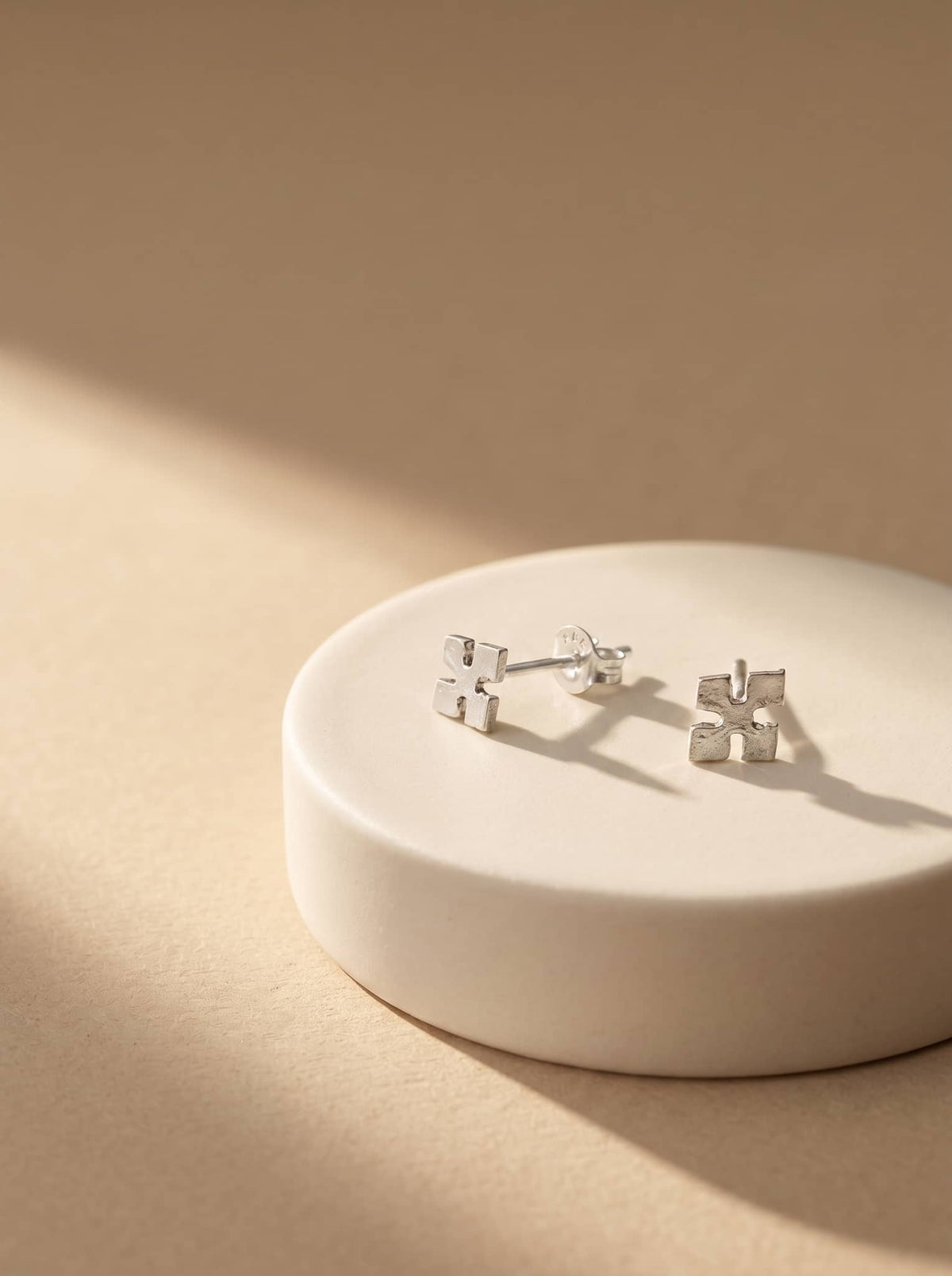 Minimal Cross Silver Stud Earrings - premium jewellery display - Hardik Jewels
