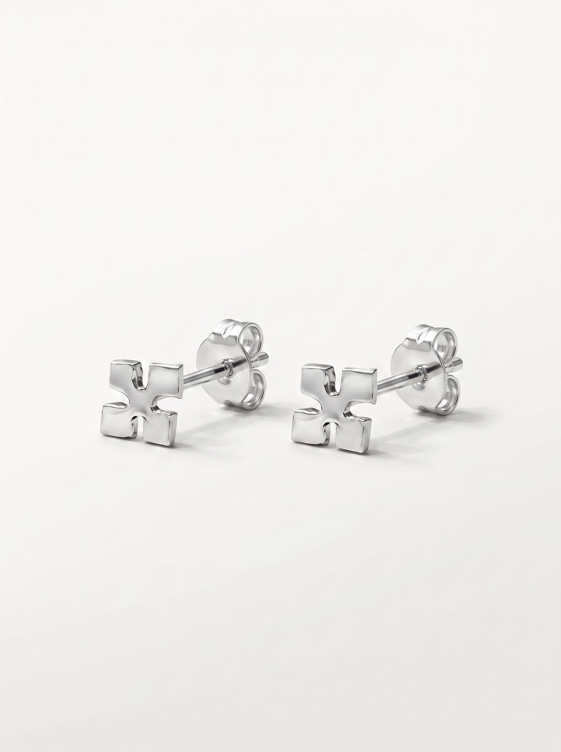 Minimal Cross Silver Stud Earrings - front studio product view - Hardik Jewels