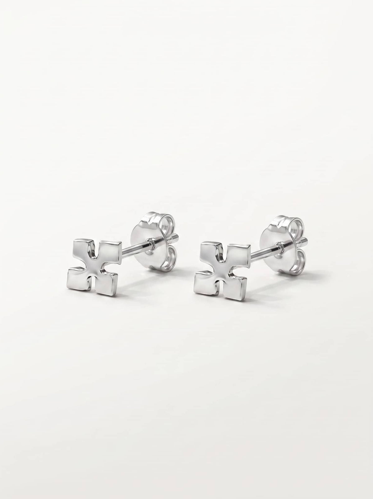 Minimal Cross Silver Stud Earrings - front studio product view - Hardik Jewels