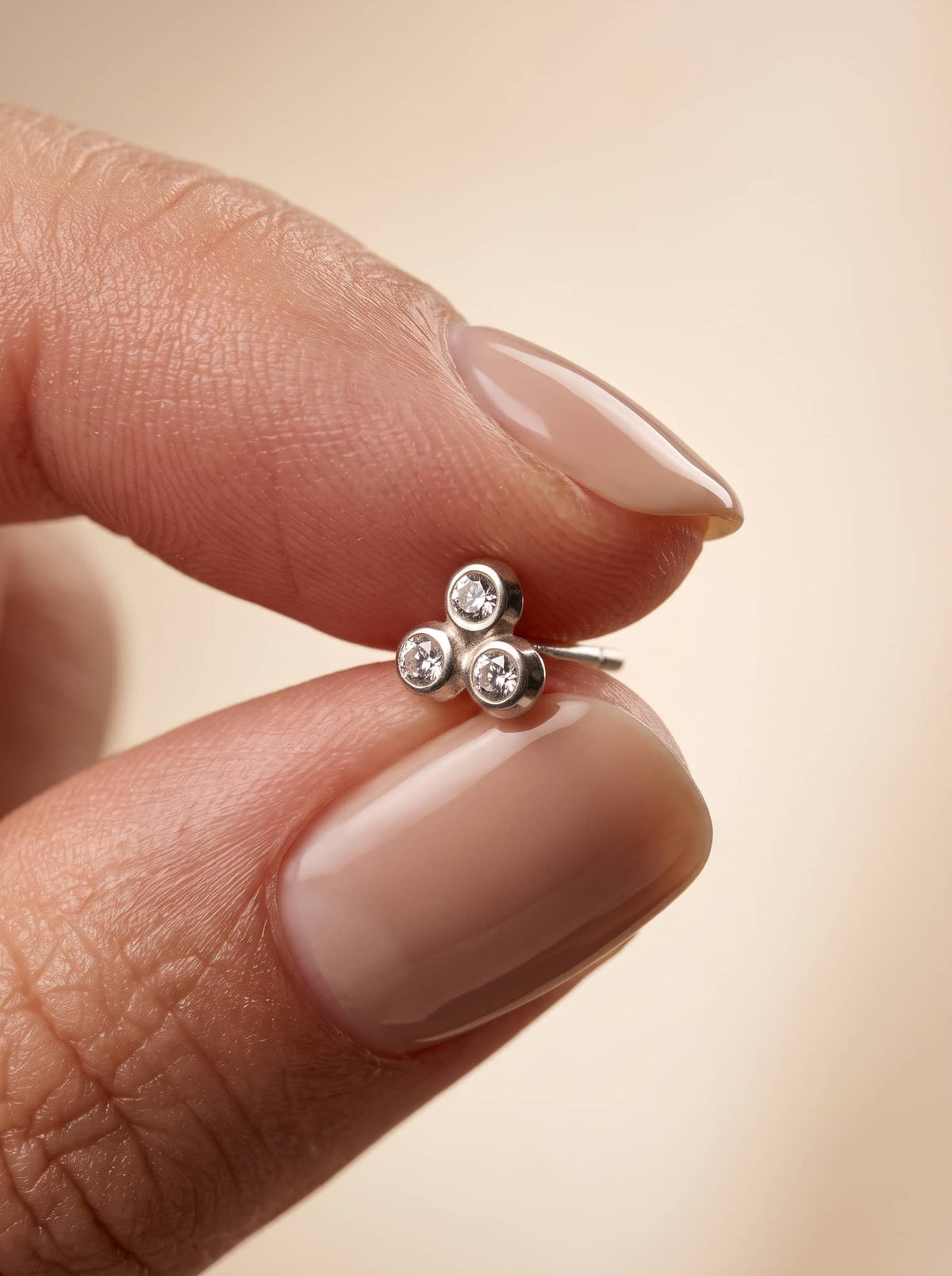 Triple CZ Cluster Silver Stud Earrings - close-up detail view - Hardik Jewels