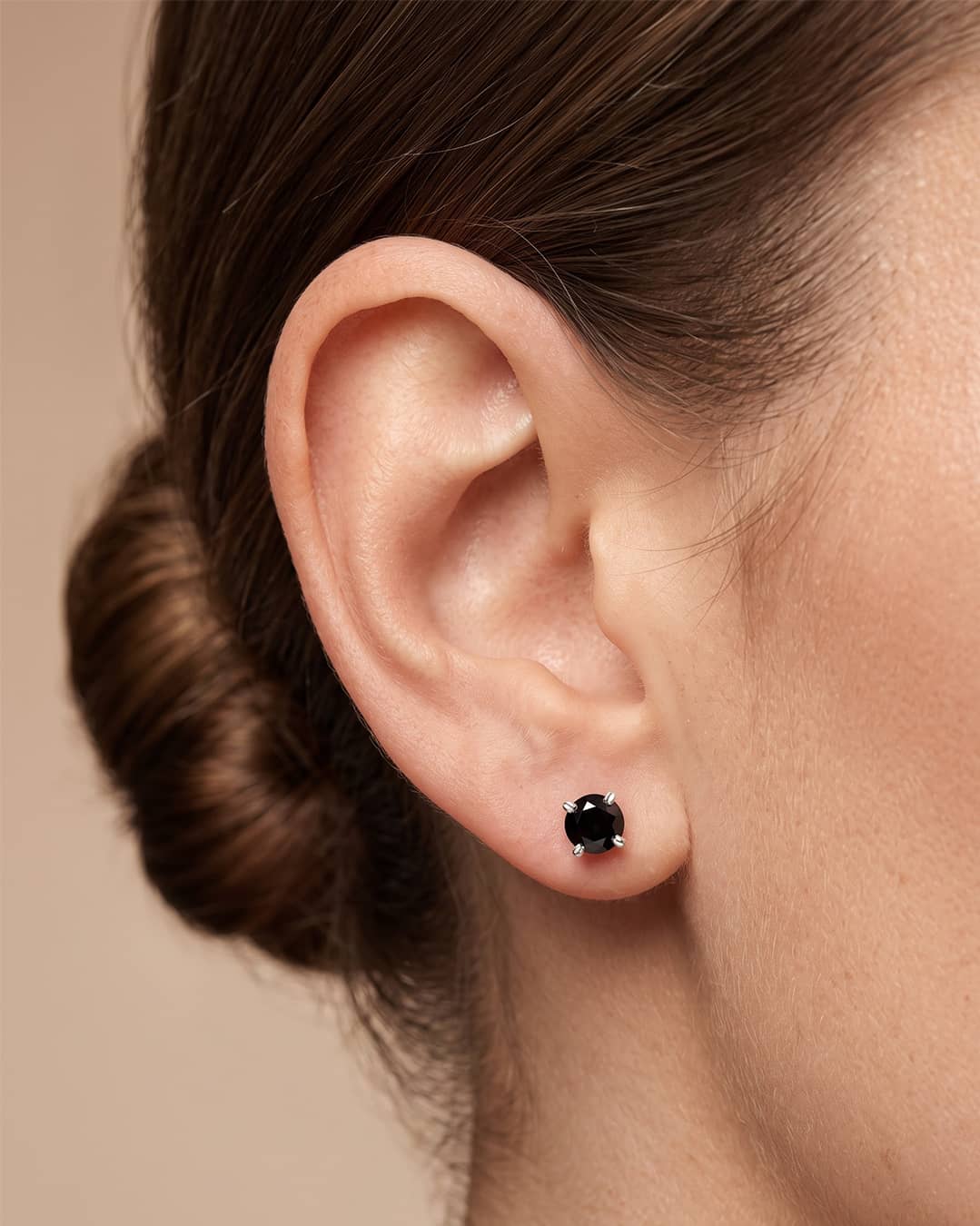 Black CZ Solitaire Silver Stud Earrings - ear styling view - Hardik Jewels