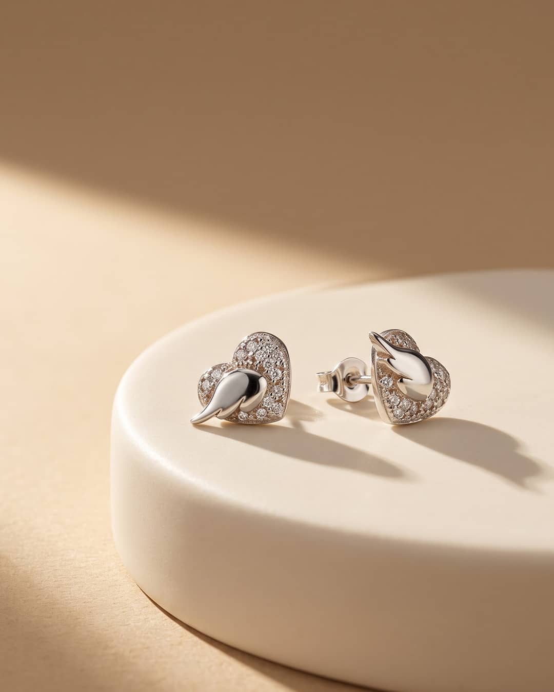 Mother of Pearl Heart Wing CZ Silver Stud Earrings - premium jewellery display - Hardik Jewels