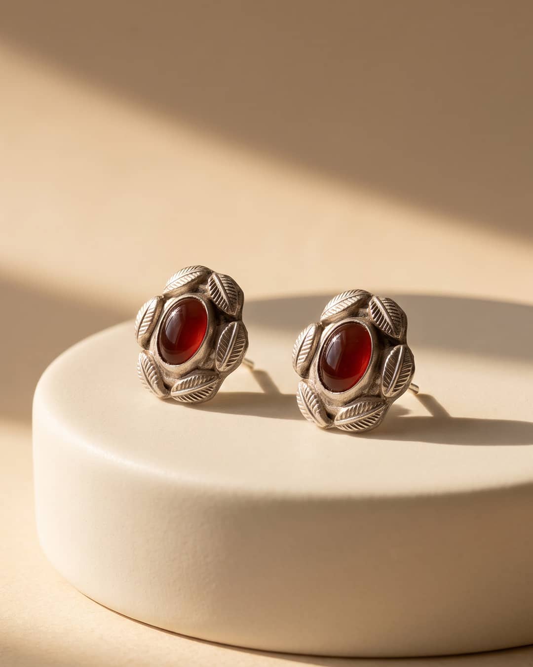 Vintage Red Stone Leaf Frame Silver Stud Earrings - premium jewellery display - Hardik Jewels