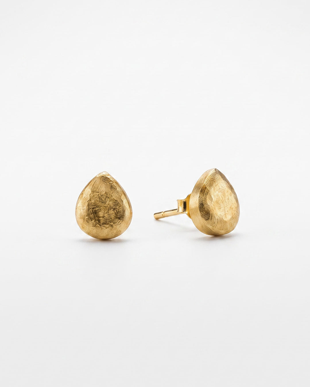 Golden Teardrop Textured Silver Stud Earrings - white background detail view - Hardik Jewels