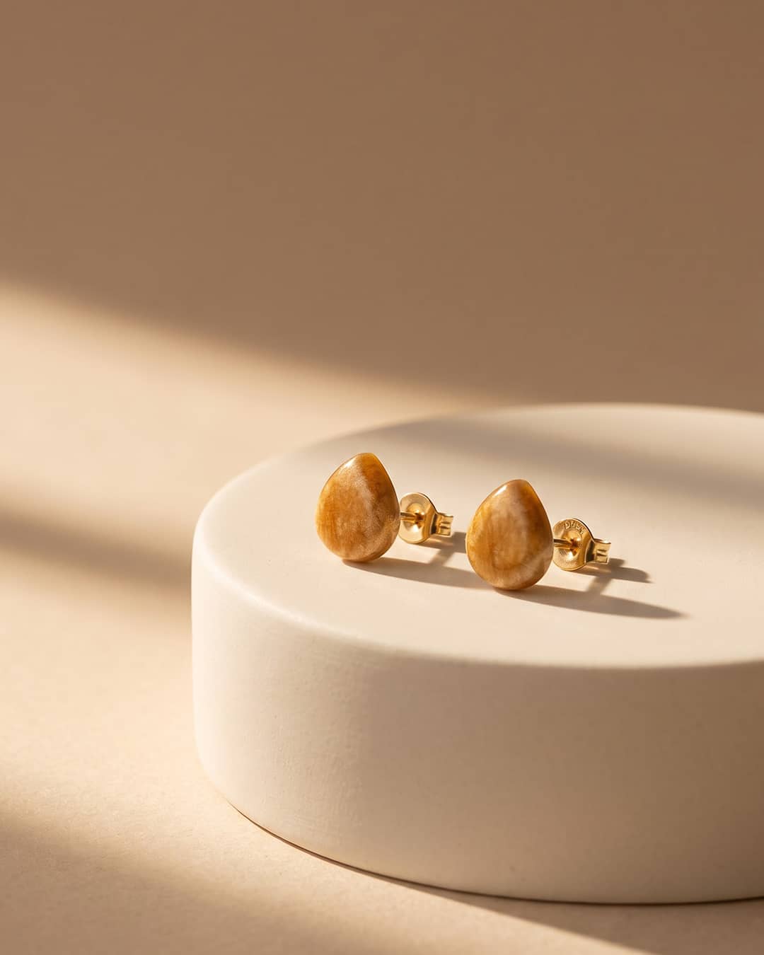 Golden Teardrop Textured Silver Stud Earrings - premium jewellery display - Hardik Jewels