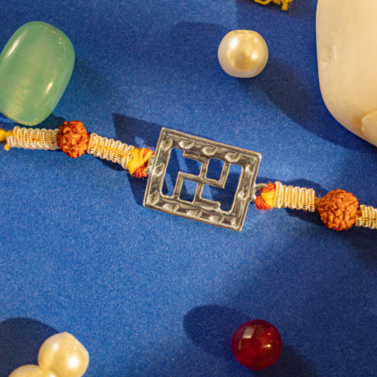 Silver Om Rakhi Online - Handcrafted by Hardik Jewels.