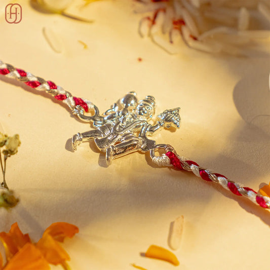 Hardik Jewels 92.5 silver hanuman rakhi with intricate silver Hanuman charm and red white braided thread