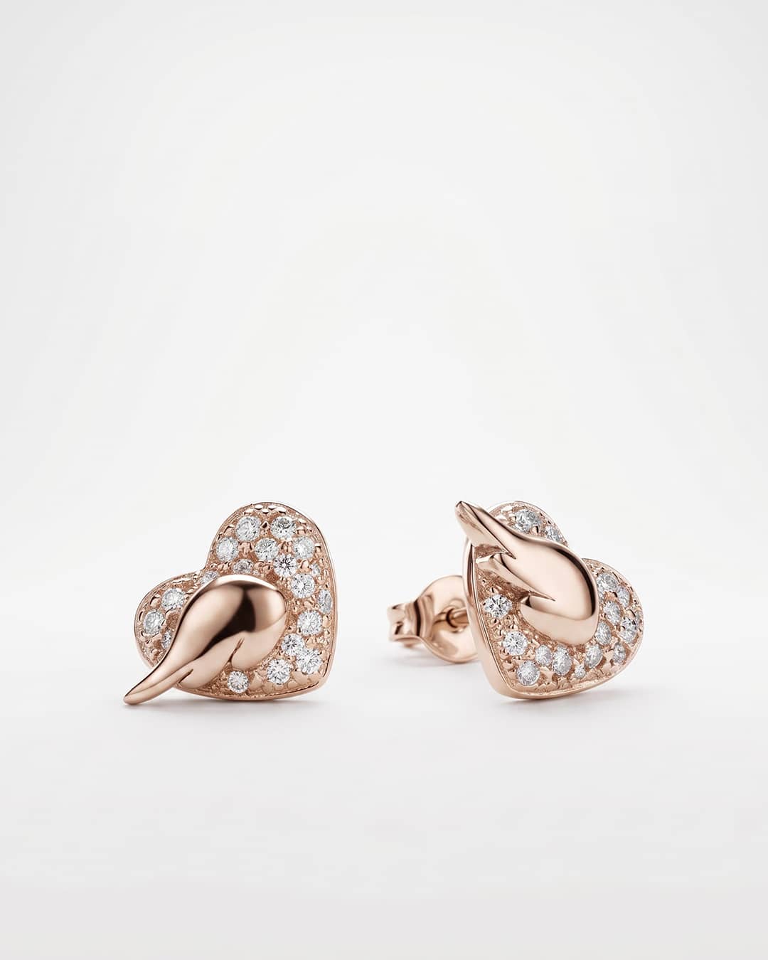 Mother of Pearl Heart Wing CZ Silver Stud Earrings - white background detail view - Hardik Jewels