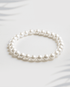 6mm white shell pearl bracelet on a white background with text indicating size.