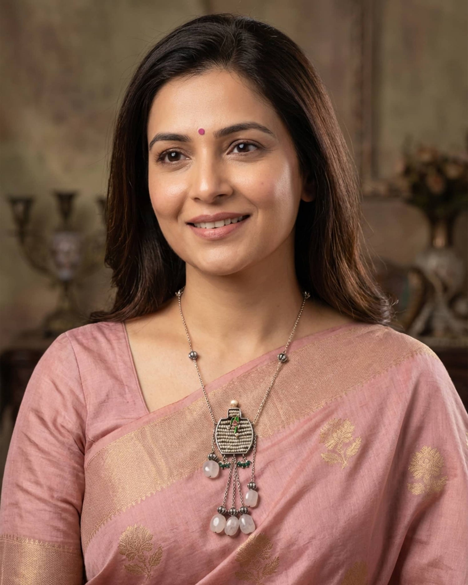 92.5 sterling silver long necklace featuring a woven pearl pendant with enamel bird and pink stone tassels.