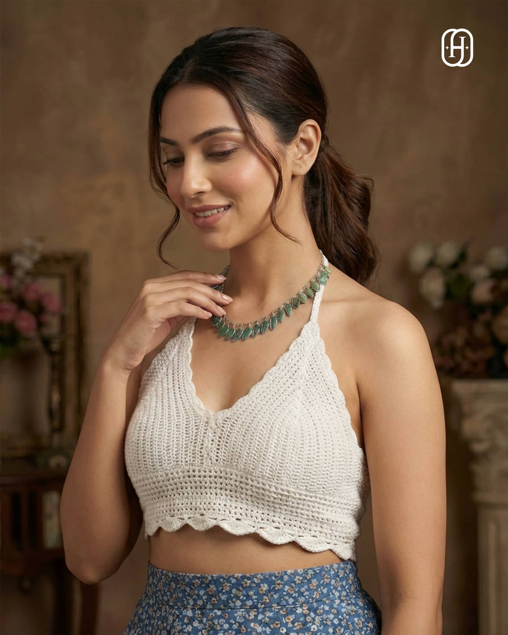 92.5 sterling silver necklace featuring hand-carved real emerald gemstone leaves.