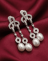92.5 sterling silver pearl stud earrings featuring a cz diamond halo and screw back closure.