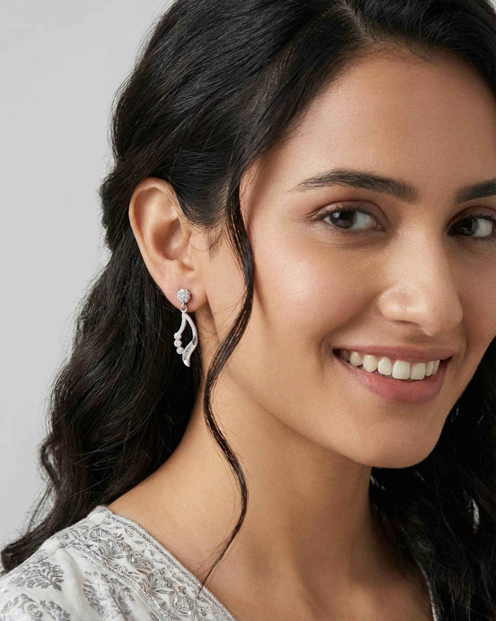 92.5 Sterling Silver CZ Ribbon Drop Earrings | Elegant Open Teardrop