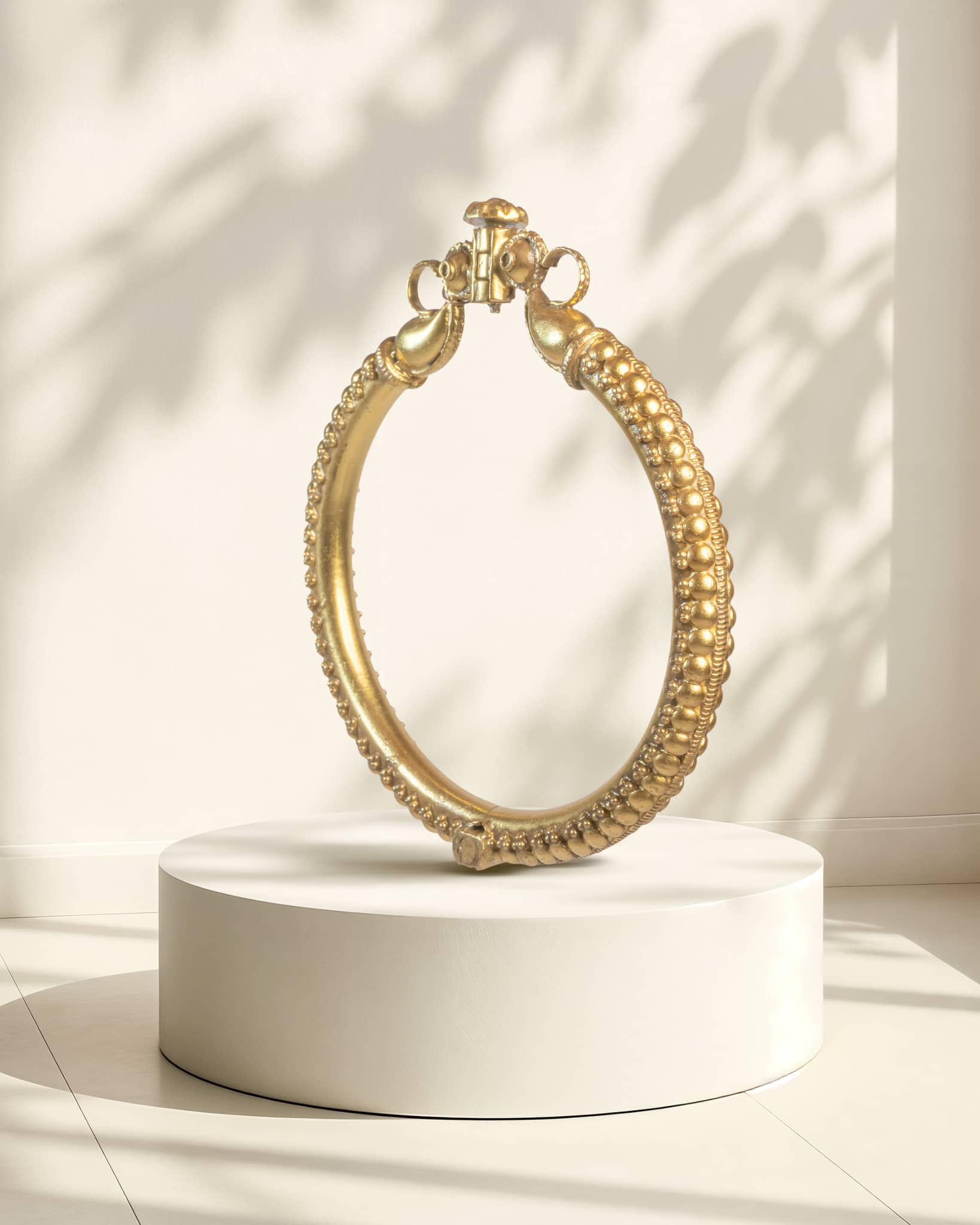 Antique gold plated silver kada featuring carved elephant heads (Gaja Mukh) and nakshi work with screw lock.