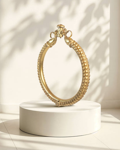 Antique gold plated silver kada featuring carved elephant heads (Gaja Mukh) and nakshi work with screw lock.