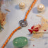 Celtic knot connector charm silver rakhi on orange thread - Hardik Jewels
