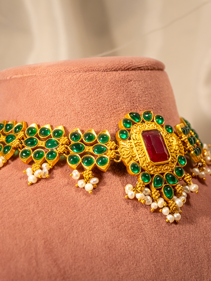 Ruby-tone centrepiece close-up on temple gold-plated silver choker by Hardik Jewels