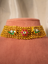 Navratna floral gold-plated silver choker with multicolour stones by Hardik Jewels