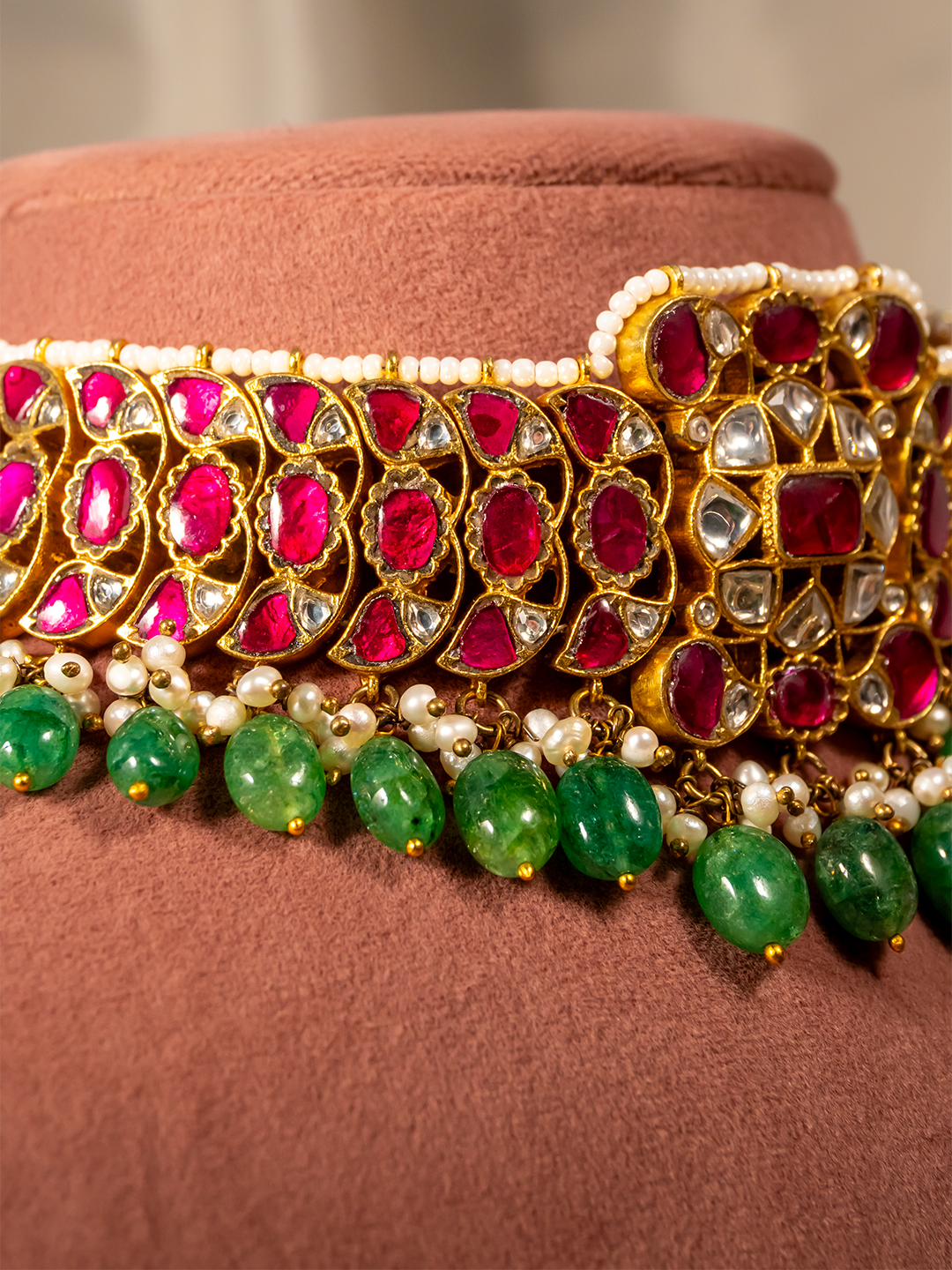 Ruby Kundan centrepiece close-up on silver bridal choker by Hardik Jewels