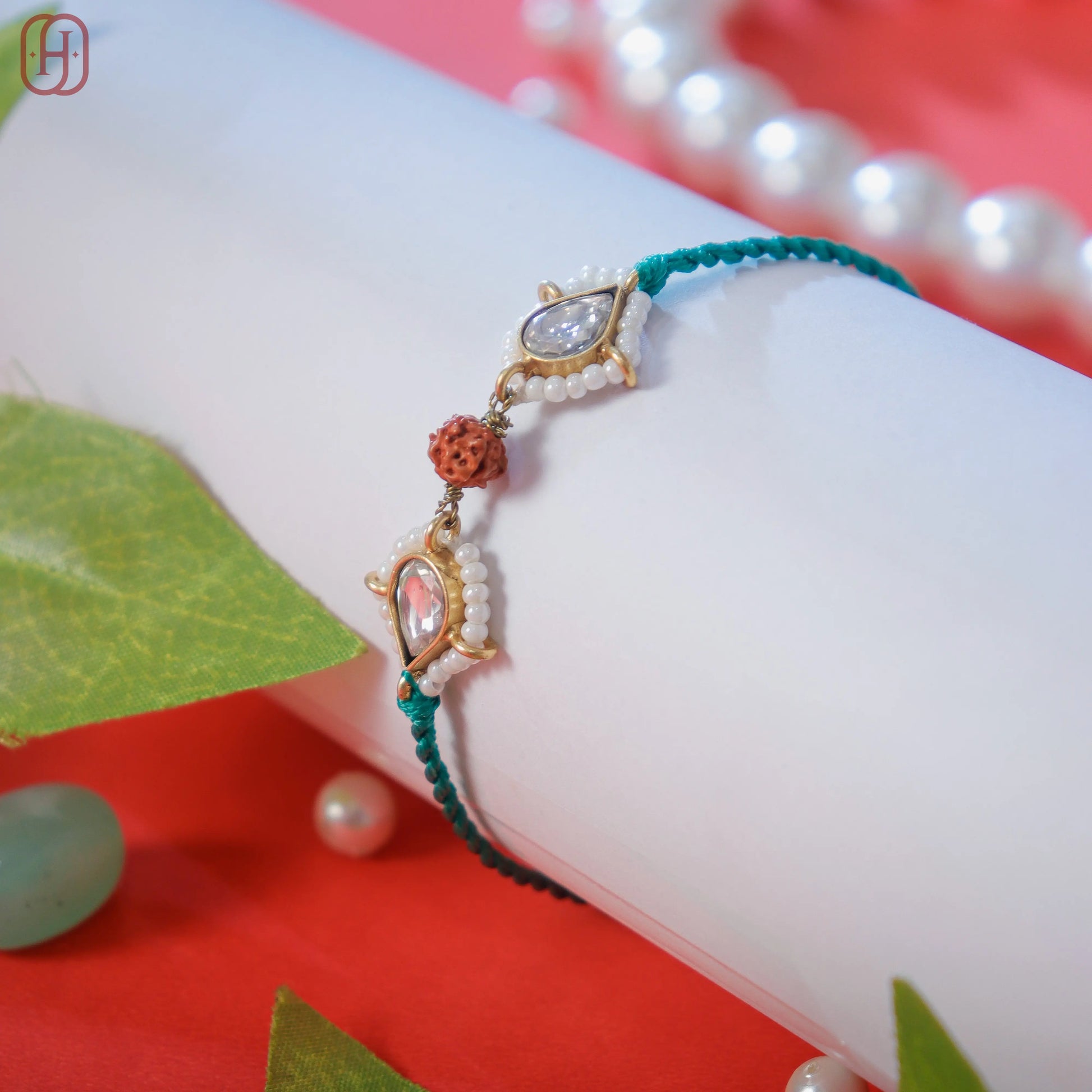 Designer Rudraksha Rakhi with 92.5 Silver Accents.