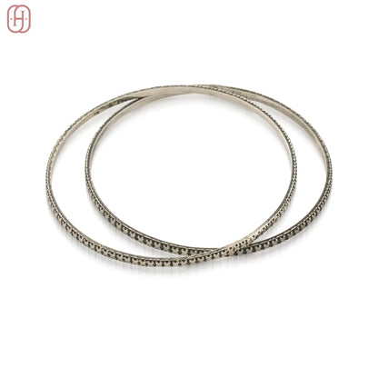 Designer Silver Bangles Set by Hardik Jewels.