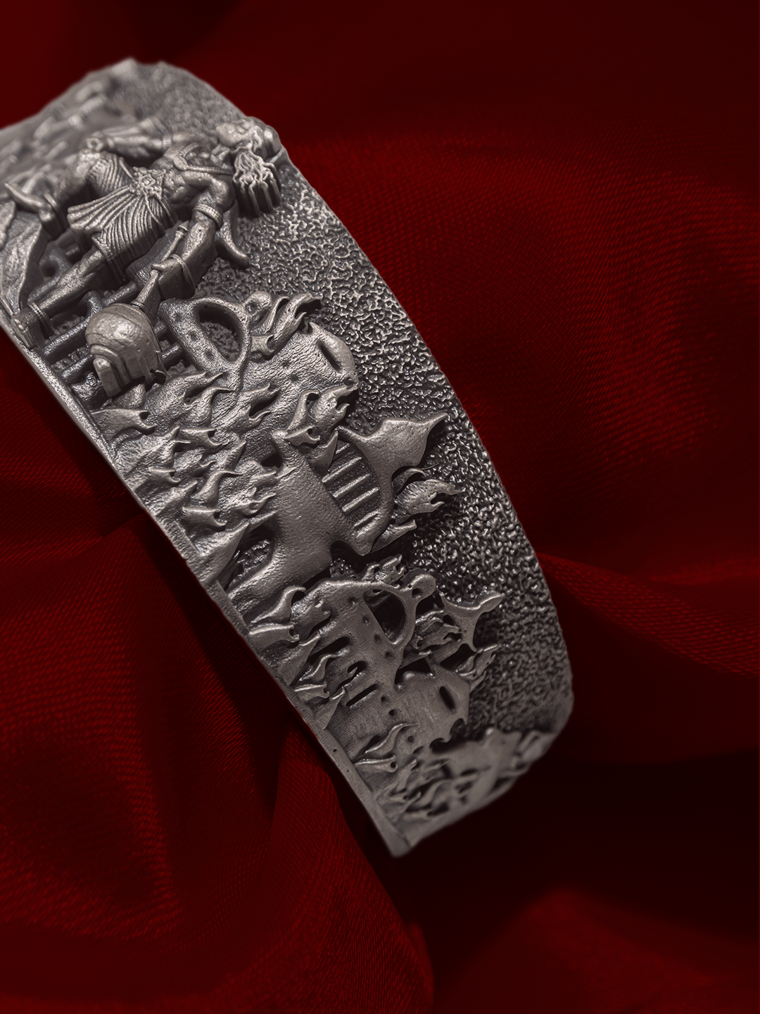 Broad silver temple nakshi kada carved battle scene close up