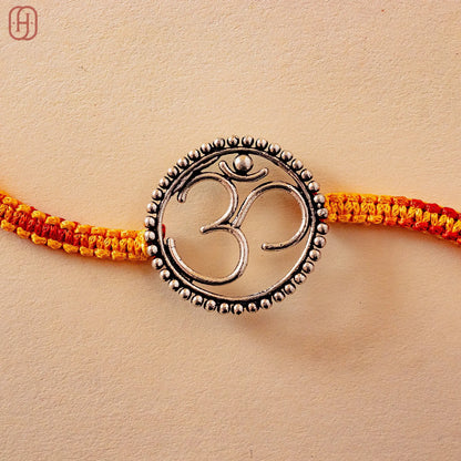 Hardik Jewels 92.5 Silver Om Rakhi - Handcrafted Design.
