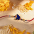 Hardik Jewels Butterfly Silver Rakhi with Blue Enamel.