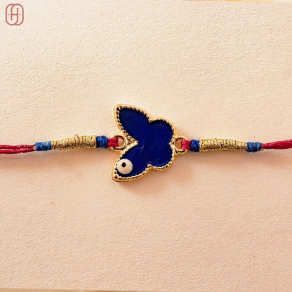 Hardik Jewels Butterfly Silver Rakhi with Blue Enamel.