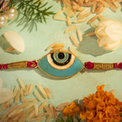 Hardik Jewels Evil Eye Silver Rakhi with Handcrafted Design.