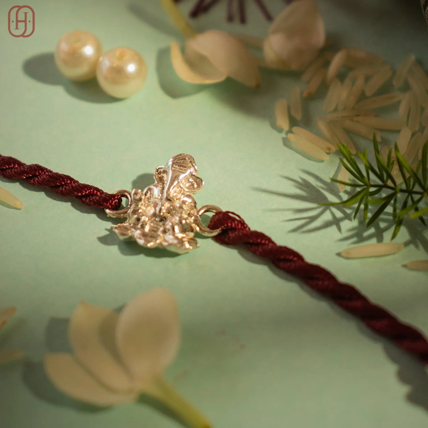 Hardik Jewels Ganesh Silver Rakhi Online - Elegant 92.5 Silver.