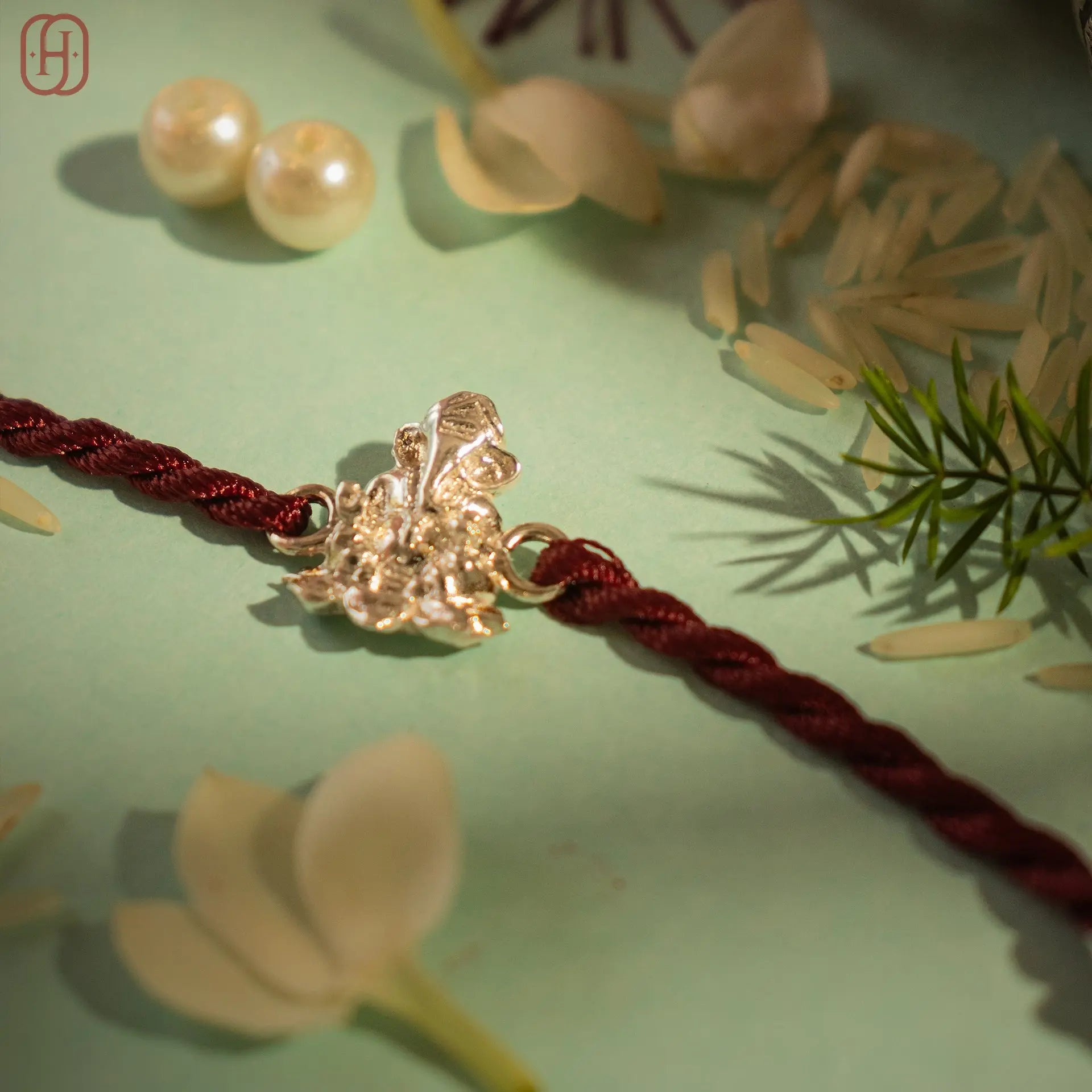 Hardik Jewels Ganesh Silver Rakhi Online - Elegant 92.5 Silver.