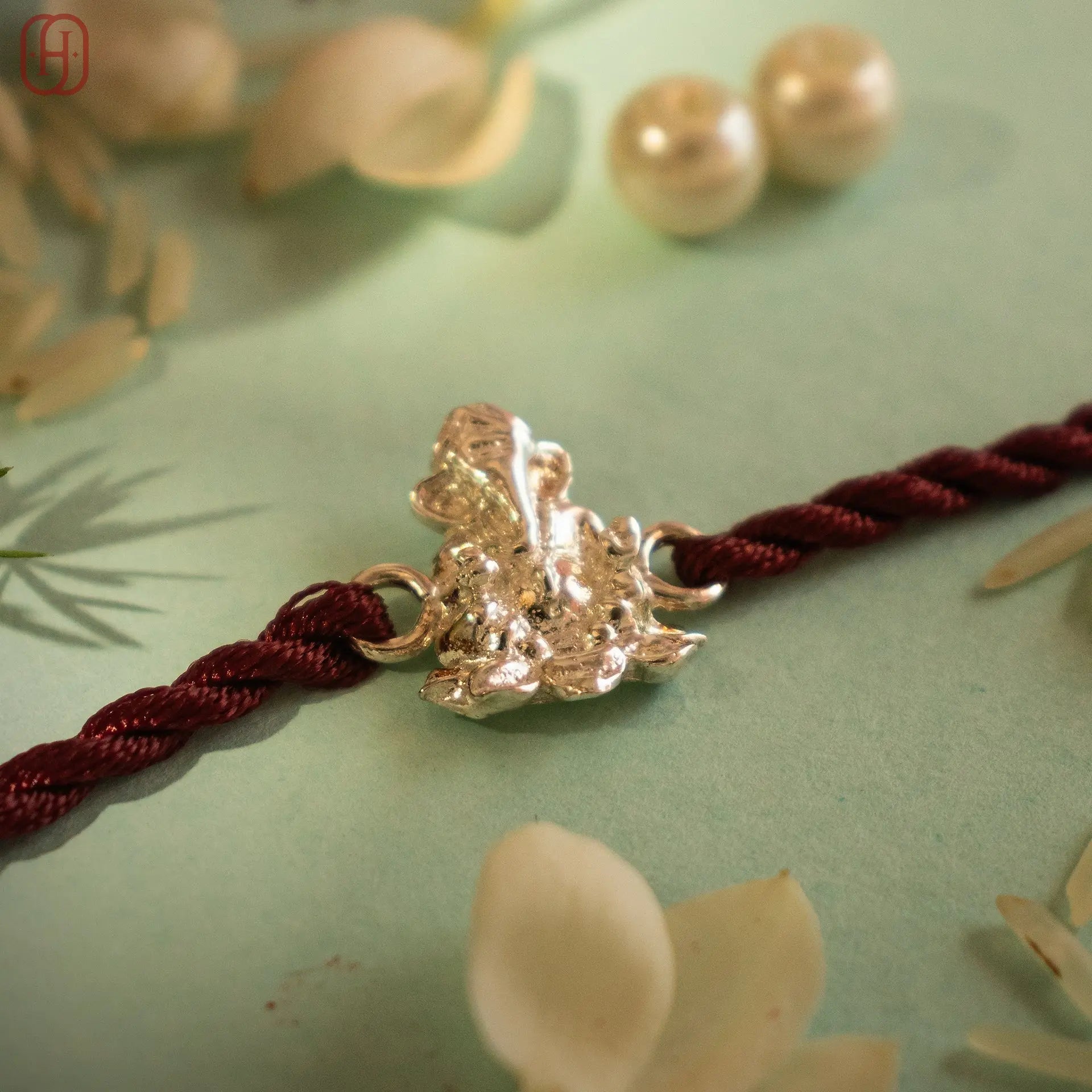 Hardik Jewels Ganesh Silver Rakhi Online - Elegant 92.5 Silver.