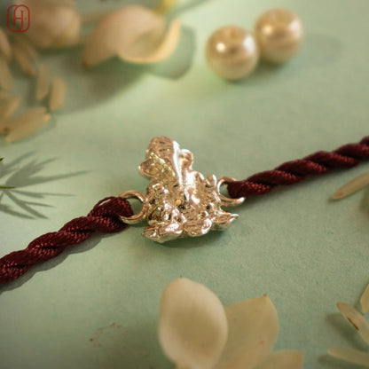 Hardik Jewels Ganesh Silver Rakhi Online - Elegant 92.5 Silver.