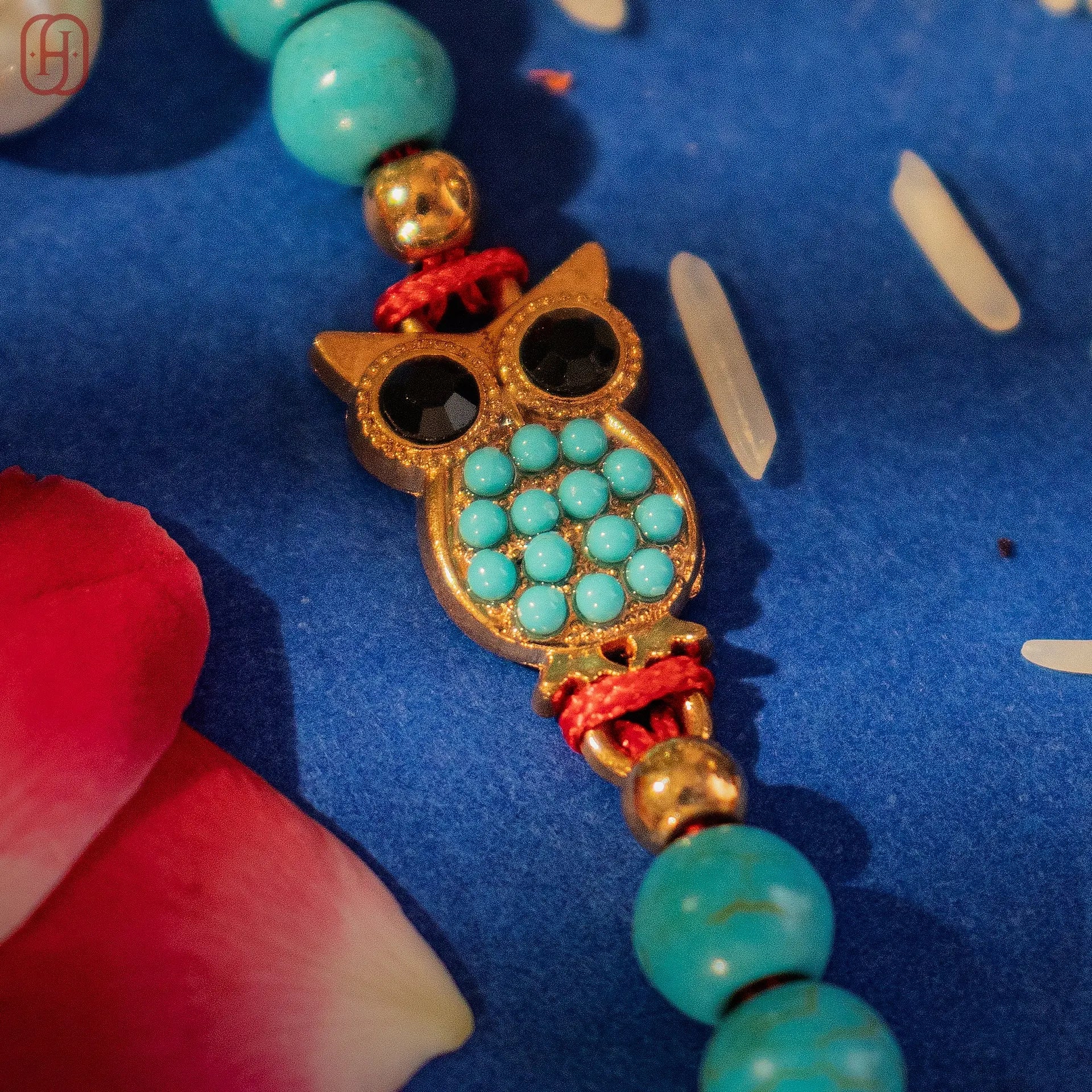 Hardik Jewels Handcrafted Owl Silver Rakhi with Turquoise Beads.