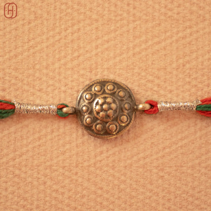 Hardik Jewels Handcrafted Silver Rakhi - Elegant Design.