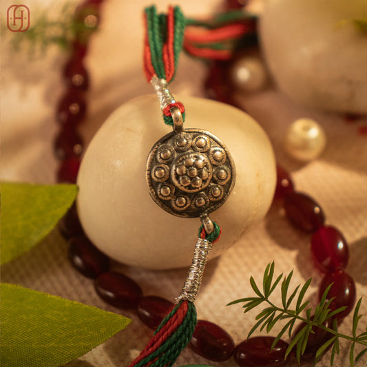 Hardik Jewels Handcrafted Silver Rakhi - Elegant Design.