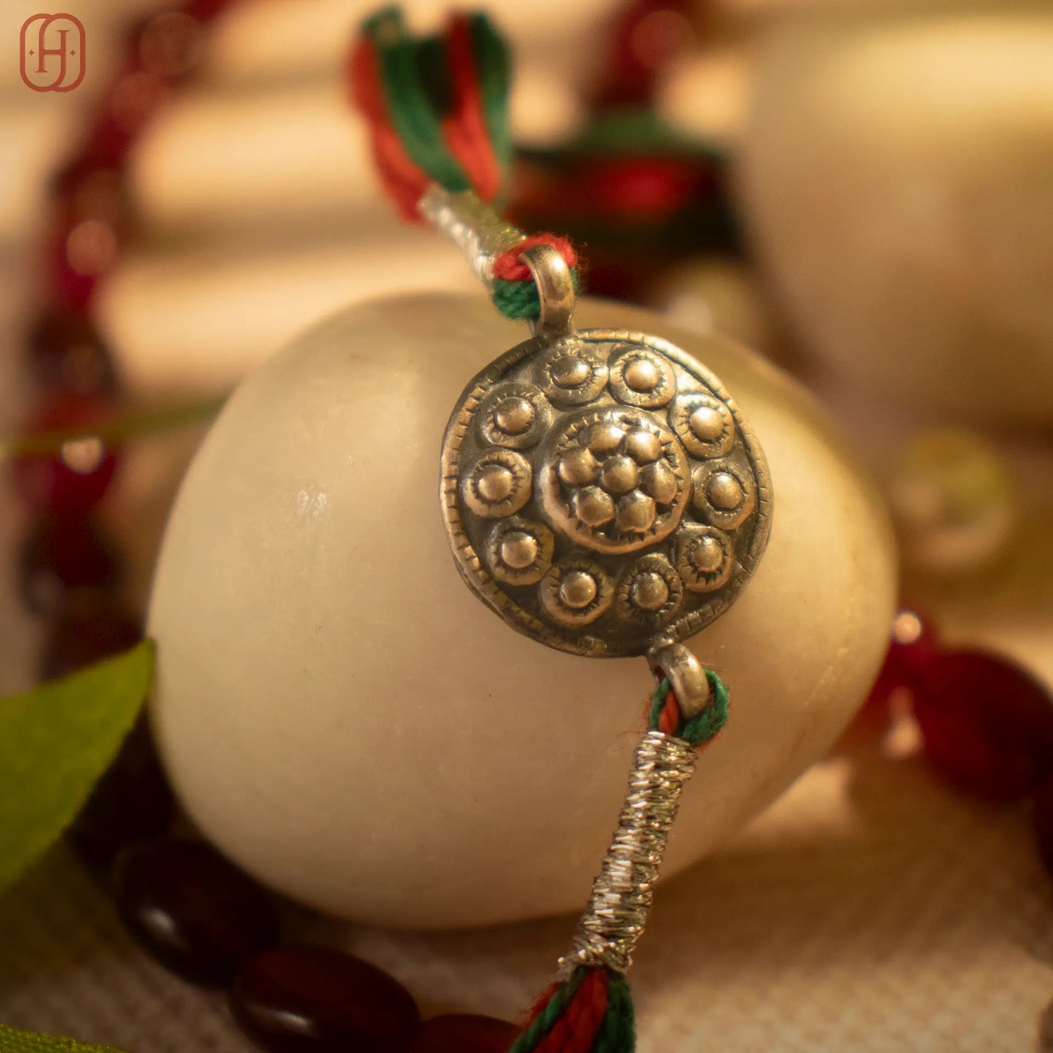 Hardik Jewels Handcrafted Silver Rakhi - Elegant Design.